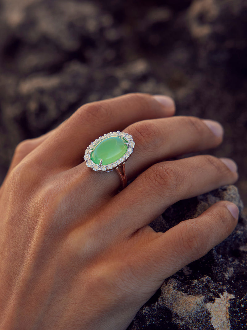 Close up of a jade ring on a woman's hand